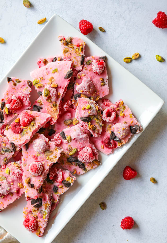 Frozen yogurt bark with chocolate pistachios and raspberry