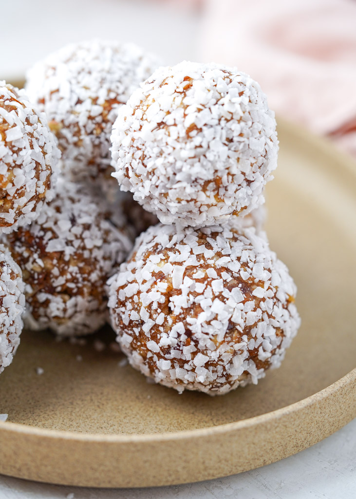 close up view of coconut date balls
