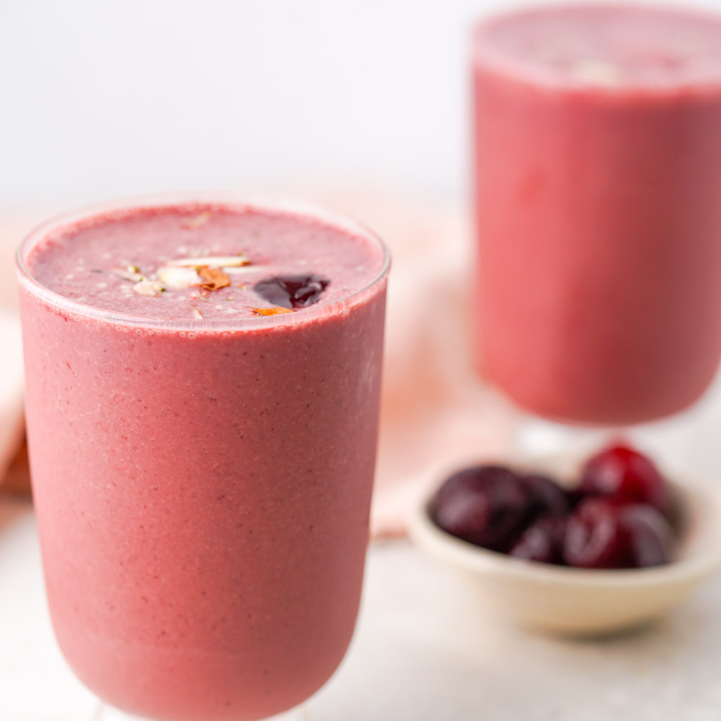 two glasses of cherry smoothie